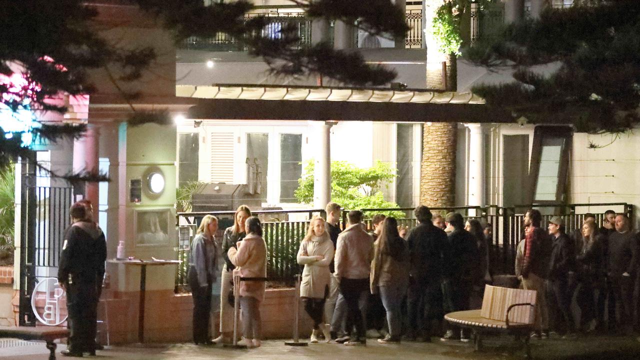 People queue outside the Coogee Bay Hotel. Picture: Damian Shaw