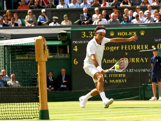 Roger Federer of Switzerland in action during the Final at Wimbledon, 2012 (Photo by AMA/Corbis via Getty Images)