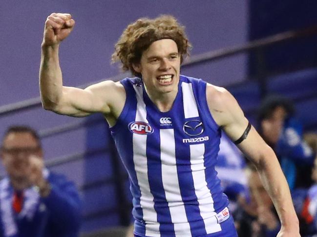 MELBOURNE, AUSTRALIA - AUGUST 12:  Ben Brown of the Kangaroos celebrates after kicking a goal during the round 21 AFL match between the North Melbourne Kangaroos and the Western Bulldogs at Etihad Stadium on August 12, 2018 in Melbourne, Australia.  (Photo by Scott Barbour/Getty Images)