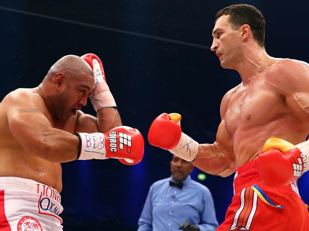 Wladimir Klitschko (R) of Ukraine exchanges punches with Alex Leapai (L) of Australia during their WBO, WBA, IBF and IBO heavy weight title fight in 2014 in Germany. Picture: Martin Rose/Bongarts/Getty Images.