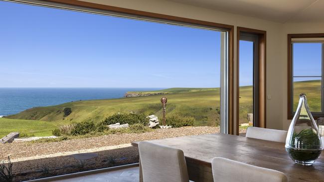 Clifftop and water views from the living and dining area.