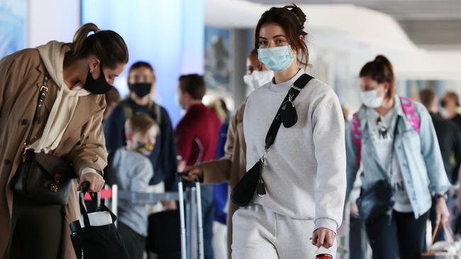 AFL wags arrive at Brisbane Airport last month. Picture: Liam Kidston