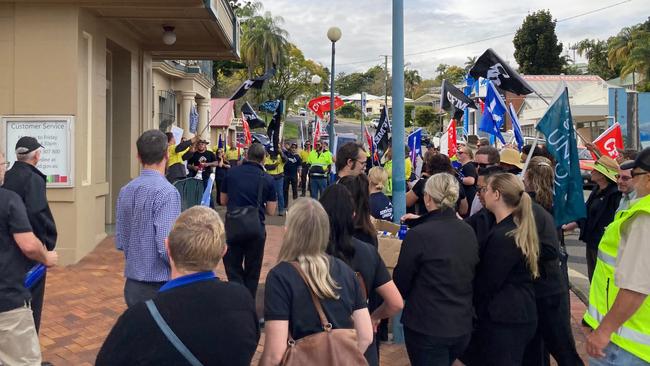 Protesters chanted outside the town hall offices of Mayor Glen Hartwig and acting CEO David Lewis for 15 minutes.