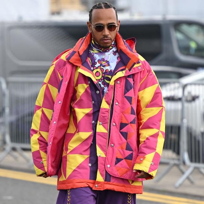 Lewis Hamilton rocking a special look as he arrives in the paddock ahead of the Formula One British Grand Prix at the Silverstone motor racing circuit. Picture: JUSTIN TALLIS / AFP)