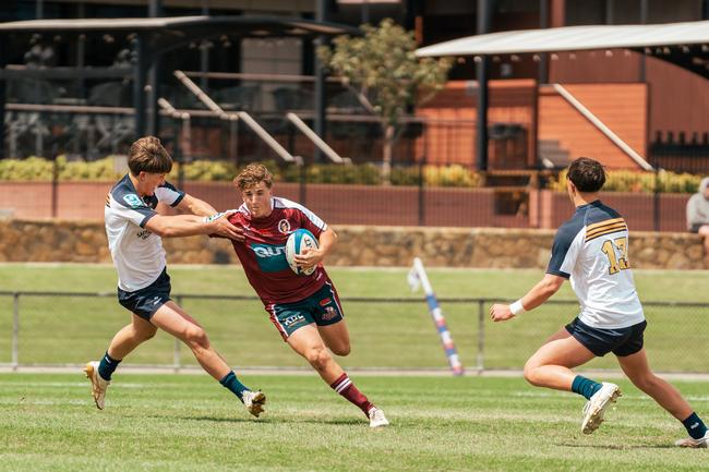 Rohan Nichol. Action from the round two game between the Reds and Brumbies. Picture courtesy of ACT Brumbies Media.