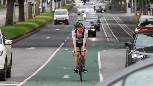 A bike lane in the middle of two vehicles at the corner of Elizabeth St and Victoria St. Picture: Ian Currie