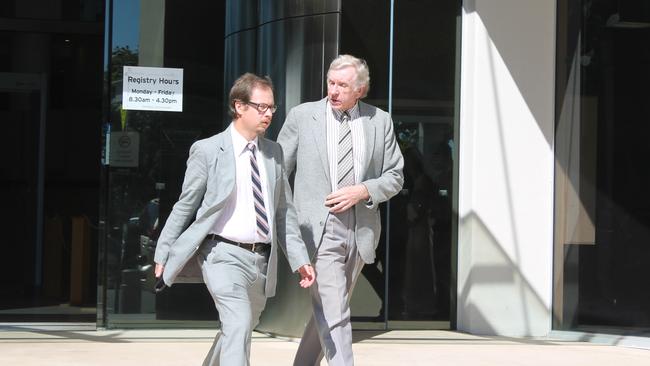 Vincent Berg (right) leaves the Southport Magistrates Court. Picture: Meagan Weymes.