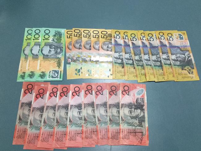 Drugs and cash seized in a raid into a Sippy Downs home by Sunshine Coast Police last night.