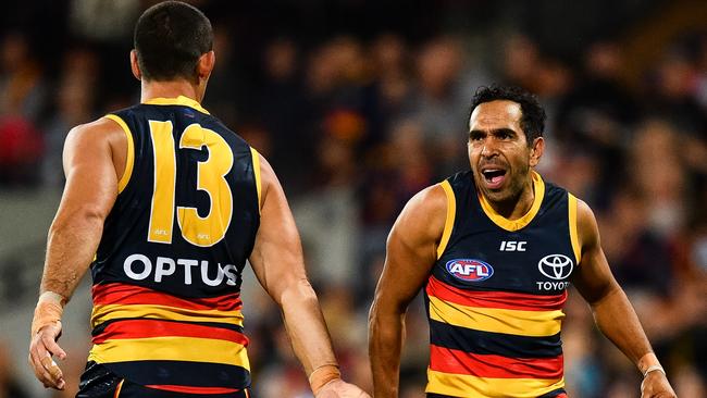 Taylor Walker congratulates Eddie Betts after one of his six goals. Picture: Getty Images 