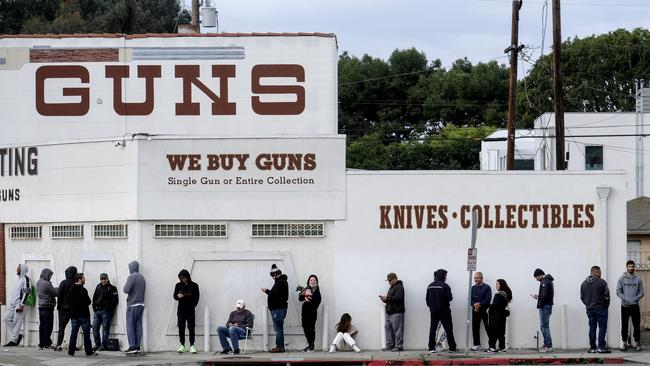 People waiting in a line to enter a gun store in California amid the coronavirus pandemic. Picture: AP