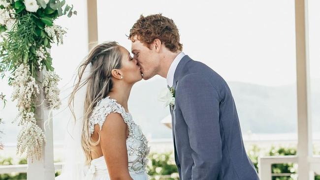The childhood sweethearts on their wedding day.