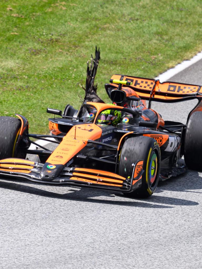 He had no hope with that punctured tyre. (Photo by MAX SLOVENCIK / APA / AFP) / Austria OUT