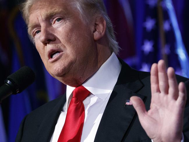 FILE - In this Nov. 9, 2016, file photo, President-elect Donald Trump speaks during a rally in New York. CEOs of major companies are taking stands about the results of the November 2016 U.S. election, a departure from the traditional model of not mixing politics with business that the major brands have long espoused. The men and woman who head the nationâ€™s biggest companies know that having a hostile relationship with the incoming Trump Administration could make doing business difficult. (AP Photo/ Evan Vucci, File)