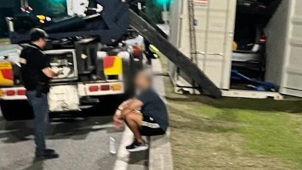 Mostafa Baluch is arrested after Queensland police, acting on information, check trucks crossing the border from NSW.