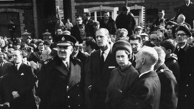 Queen Elizabeth II and Prince Philip visit the coalmining village of Aberfan in South Wales, eight days after the disaster in which 116 children and 28 adults were killed in 1966. Picture; Getty Images.