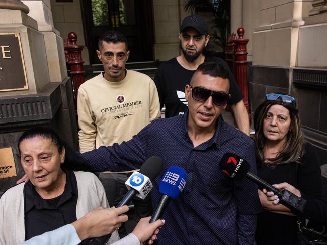 Maryam Hamka’s mother Susan Iramiyan (left) and brother Hassan Hamka (centre) speak to media after Loughnane’s sentence. Picture: Diego Fedele