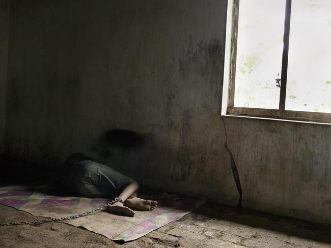 This man has a psychosocial disability and is chained in a room of his family home in Ponorogo, East Java. Picture: Andrea Star Reese/Human Rights Watch.