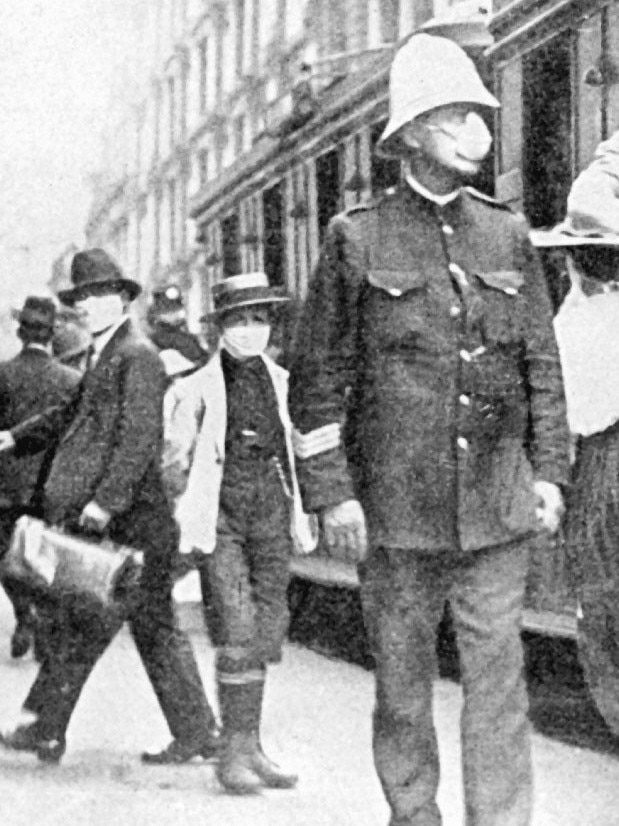 Masks are worn by people in Sydney during the Spanish flu epidemic in 1919. Picture: File