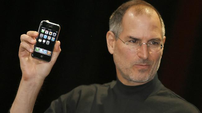 Former Apple chief executive Steve Jobs unveiling the first iPhone in 2007. Picture: Tony Avelar