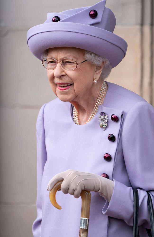 Queen Elizabeth wore lavender at the Armed Forces Act of Loyalty Parade at the Palace of Holyroodhouse in Edinburgh, Scotland. Picture: AFP