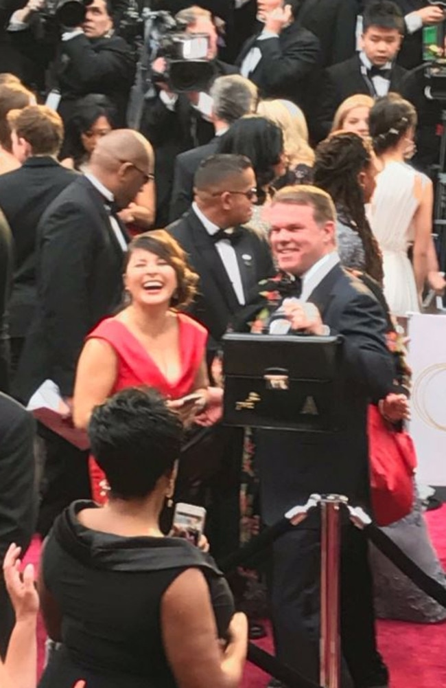 Marta L Ruiz and Brian Cullinan lapping it up on the Oscars red carpet. Picture: Twitter