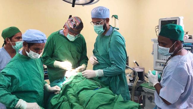 Adelaide doctors in East Timor performing surgery. Picture: Zameer Gill