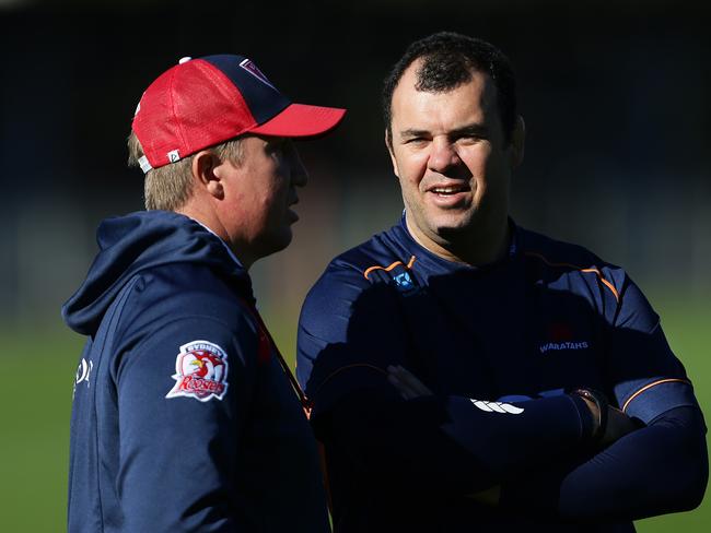 Michael Cheika with Trent Robinson during Sydney Roosters training at Moore Park. Picture: Brett Costello