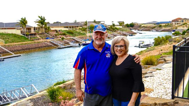 Retired SANFL player Kym Hodgeman with wife Karen at their Wallaroo home. Picture: Supplied