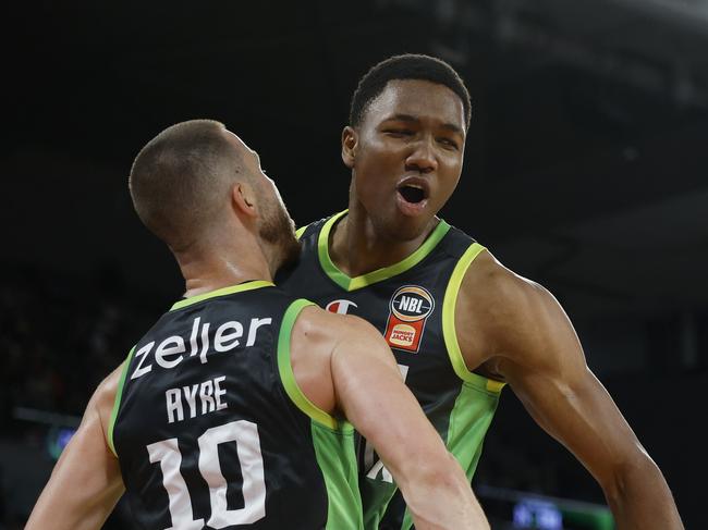 MELBOURNE, AUSTRALIA - FEBRUARY 16: Ben Ayre of the Phoenix celebrates a basket with Malique Lewis of the Phoenix during the NBL Play-In match between South East Melbourne Phoenix and Adelaide 36ers at John Cain Arena, on February 16, 2025, in Melbourne, Australia. (Photo by Daniel Pockett/Getty Images)