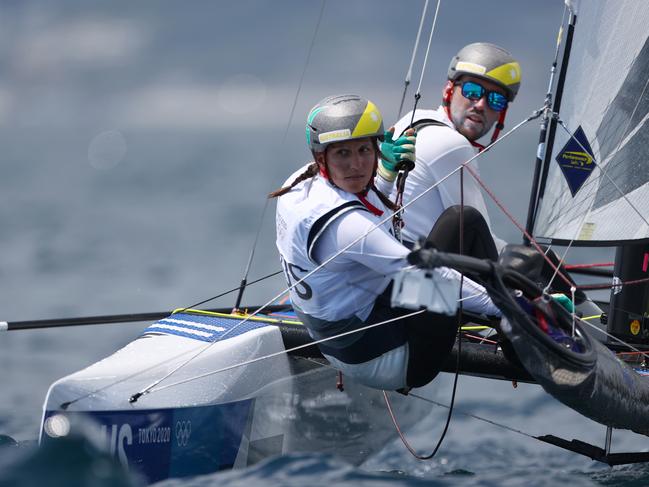 Jason Waterhouse and Lisa Darmanin of Team Australia compete in the Nacra 17 Foiling class on day eight of the Tokyo 2021 Olympic Games at Enoshima Yacht Harbour on July 31, 2021 in Fujisawa, Kanagawa, Japan. (Photo by Clive Mason/Getty Images)