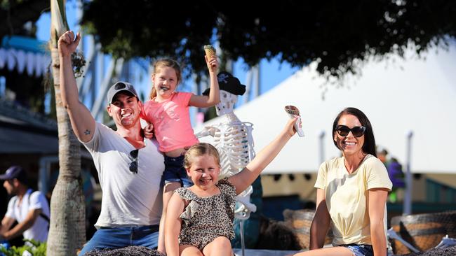 Brisbane family Jason Davies and Partner Chelsea Wintour enjoy a day out at SeaWorld with their children Charlotte, 7, and Pippa, 6. Photo: Scott Powick News Corp