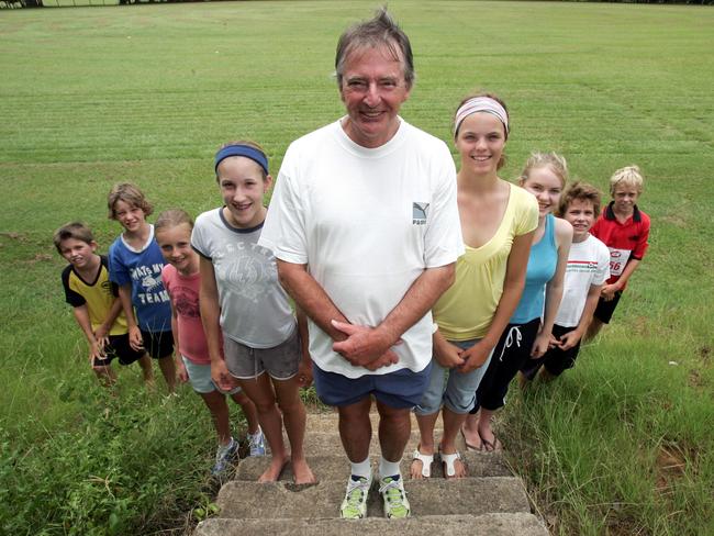 JANUARY 29,  2006:   News Reporter:Jeremy Pierce :Pics a Murwillumbah Sports Ground of Hugh Small who will be running the Commonwaelth Games Baton. Hugh getting some practice in with the kids he trains with a bottle of water as a baton PicAnn-Louise/Hovey   sport L-R Aaron Booth 9, Keelan Biltoft 11, Bronte Anthony 11, Ashley Biltoft 13, Hugh Small, Molly Baxter 14, Rachel Whitford 13, Lincoln Booth 11 and Elliot Butler 11.