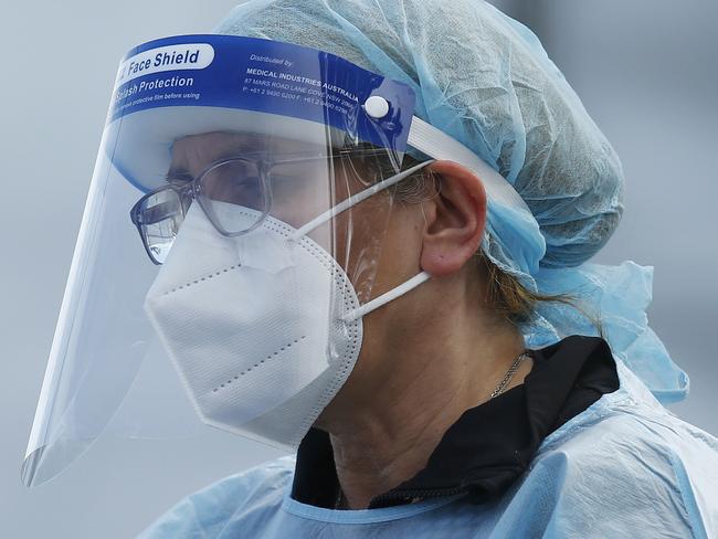 MELBOURNE, AUSTRALIA - NewsWire Photos SEPTEMBER 18, 2020:   Health workers are seen in full PPE at a pop-up COVID19 test site in Clyde, Melbourne, Victoria. Picture: NCA NewsWire / Daniel Pockett