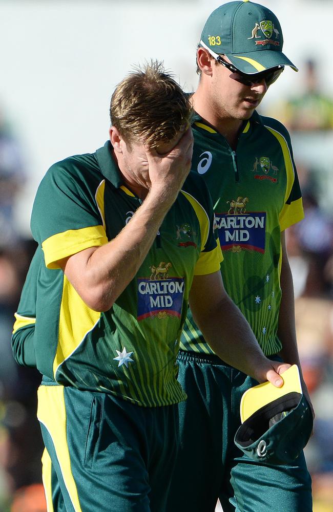 James Faulkner is distraught and has to be consoled by Josh Hazlewood as he walks off the WACA.