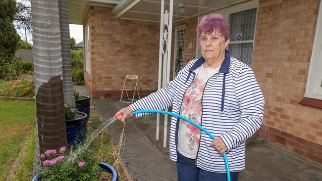 English Ave resident Dianne Turner outside her Clovely Park home that will be demolished because of the South Rd upgrade. Picture: NCA NewsWire / Brenton Edwards