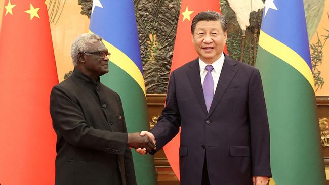 Chinese President Xi Jinping and Solomon Islands Prime Minister Manasseh Sogavare in Beijing last week. Picture: Reuters