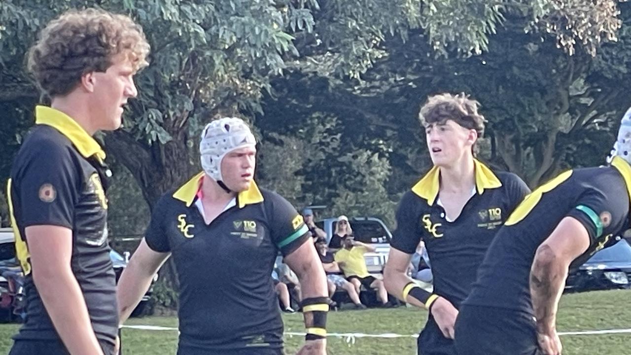 St Laurence's winger Owen Frost, prop Luka Smith, halfback Joshua Madden gather themselves.