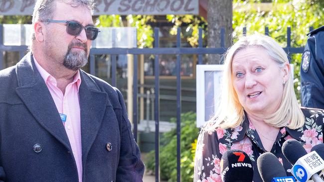 Exford Primary School assistant principal Craig Wilson stands with principal Lisa Campo as she talks to the media. Picture: Mark Stewart