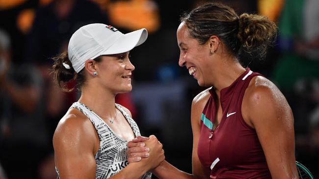 Ash Barty, left, and Madison Keys at the end of their semi-final on Thursday night. Picture: AFP