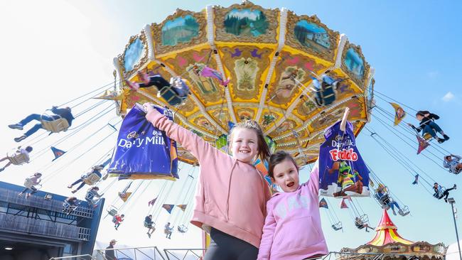 Ruby, 9 and Chelsea, 7 soaking in the Royal Melbourne Show. Picture: Tim Carrafa