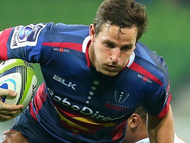 MELBOURNE, AUSTRALIA - JUNE 12: Mike Harris of the Rebels is tackled by Marcel Brache of the Force during the round 18 Super Rugby match between the Rebels and the Force at AAMI Park on June 12, 2015 in Melbourne, Australia. (Photo by Quinn Rooney/Getty Images)