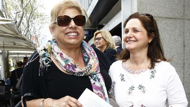 L to R: Karen Pensabene and Nella Hall from Save our Strathfield celebrate outside the Land and Enviroment Court. Picture: John Appleyard