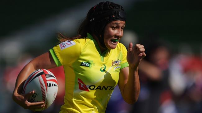 Page McGregor on her way to scoring in a HSBC Sevens World Series event.