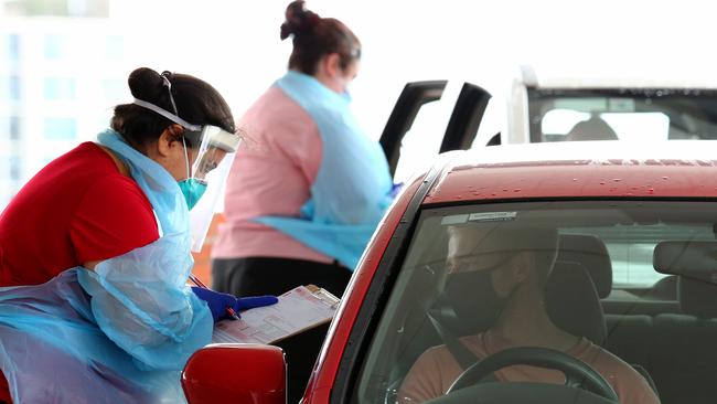 Covid testing underway on the first full day of Brisbane’s three-day lockdown after a cleaner tested positive to the UK Covid-19 strain. Picture: David Clark