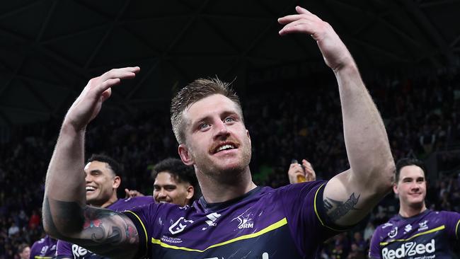 MELBOURNE, AUSTRALIA - SEPTEMBER 27:  Cameron Munster of the Storm celebrates winningthe NRL Preliminary Final match between the Melbourne Storm and Sydney Roosters at AAMI Park on September 27, 2024 in Melbourne, Australia. (Photo by Cameron Spencer/Getty Images)