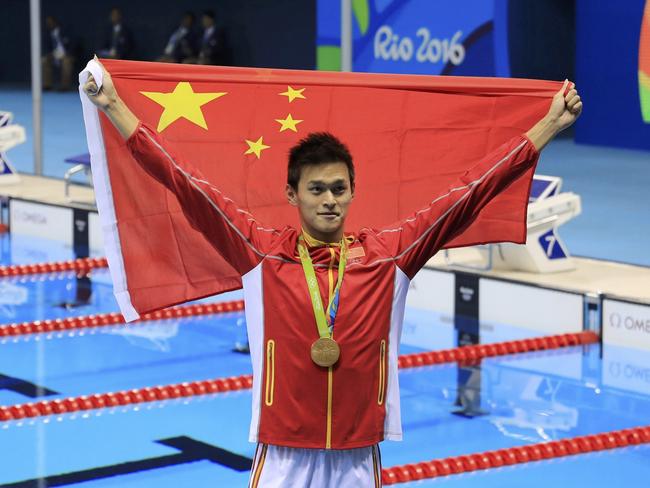 Sun Yang of China celebrates a gold medal win in Rio last year.