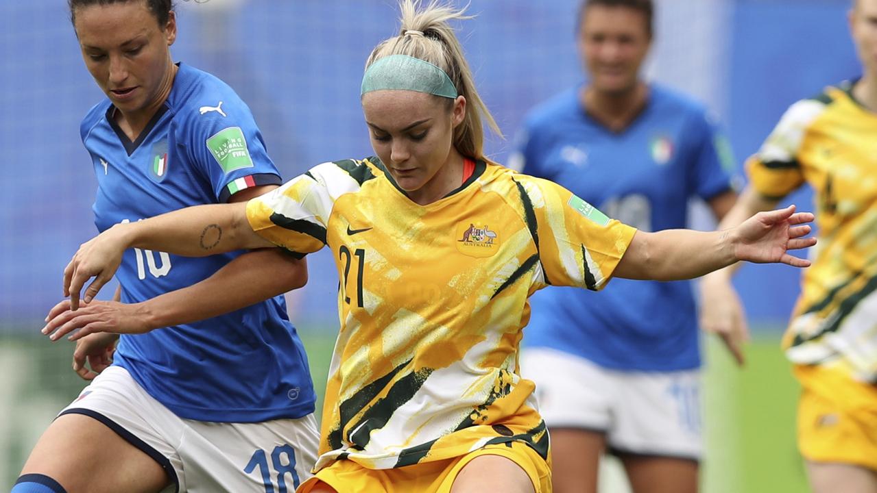 Italy's Ilaria Mauro, left, challenges Australia's Ellie Carpenter
