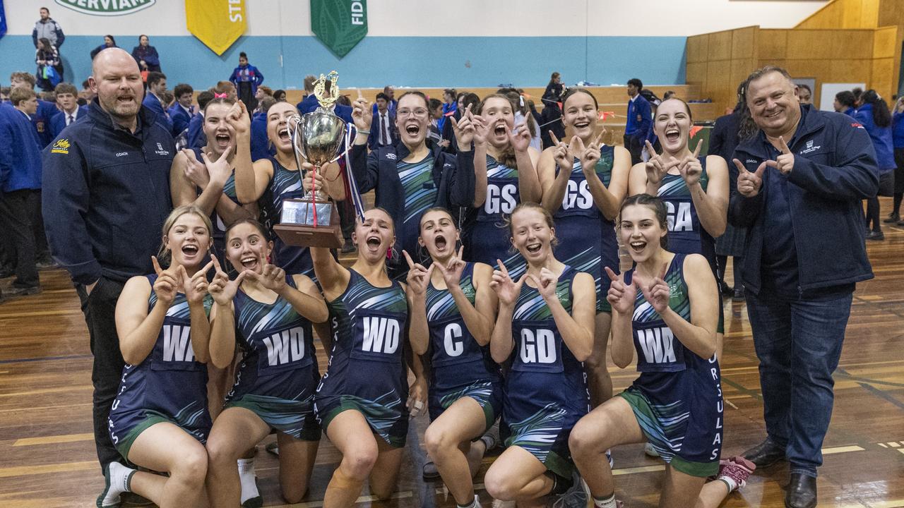 St Ursula's Senior A team lift the Merici-Chevalier Cup after defeating Downlands First VII in netball at Salo Centre, Friday, July 19, 2024. Picture: Kevin Farmer