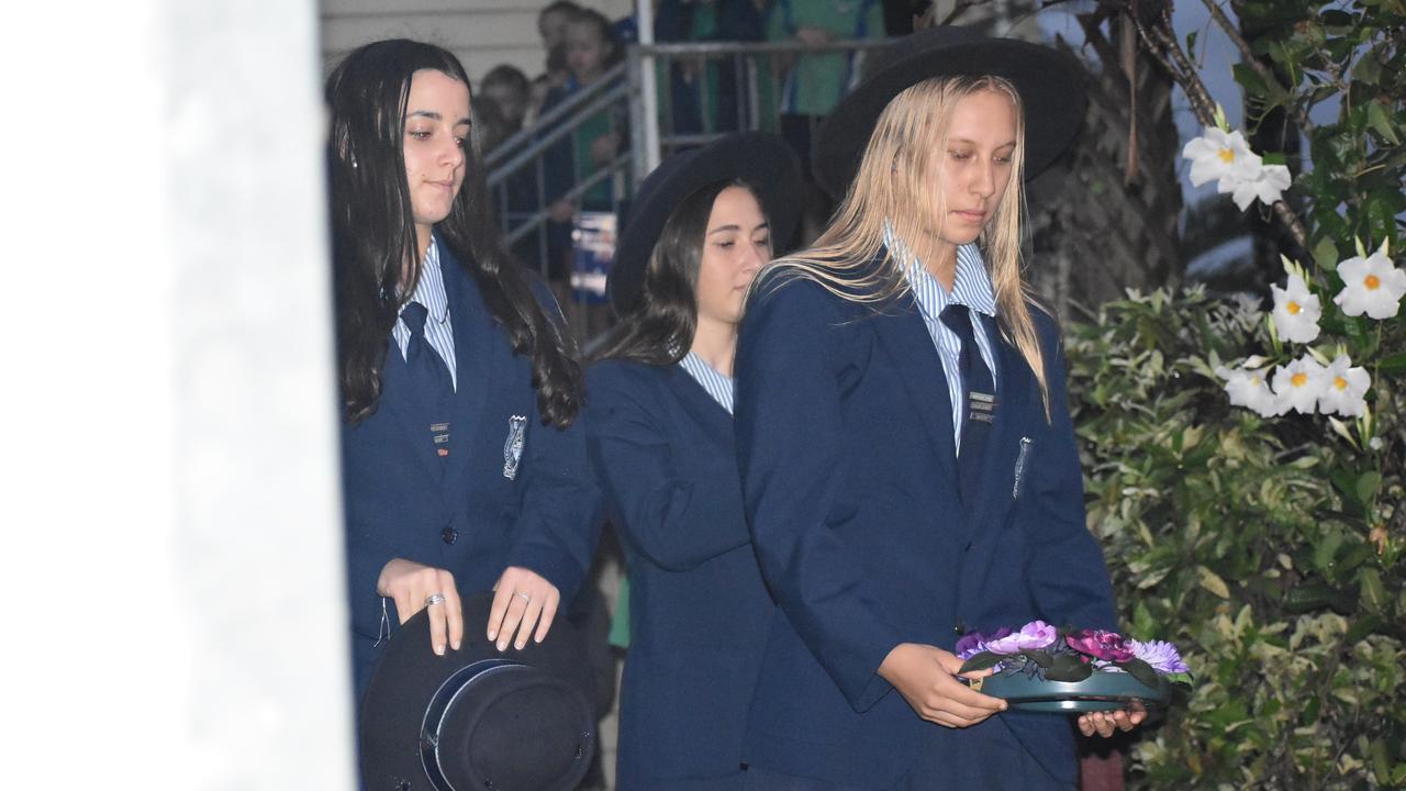 Students laying a wreath at the Kuttabul dawn service at the Hampden State School Remembrance Garden 2021. Picture: Lillian Watkins