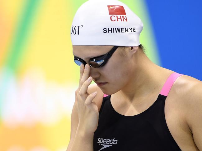 China's Ye Shiwen takes part in the Women's 400m Individual Medley heat during the swimming event at the Rio 2016 Olympic Games at the Olympic Aquatics Stadium in Rio de Janeiro on August 6, 2016. / AFP PHOTO / CHRISTOPHE SIMON